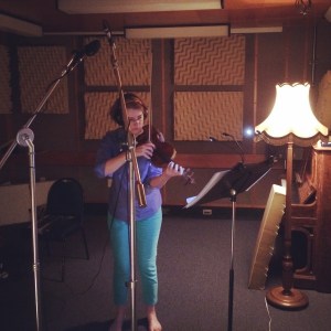 Tessa Petersen recording the violin part